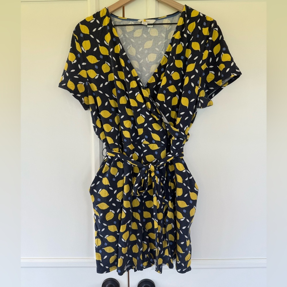 Boden Caroline romper with pockets and waist tie in Navy with Lemons, size 16.